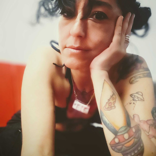 María E.