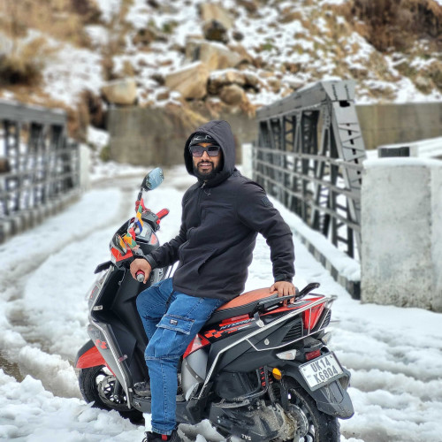 Ajay B.